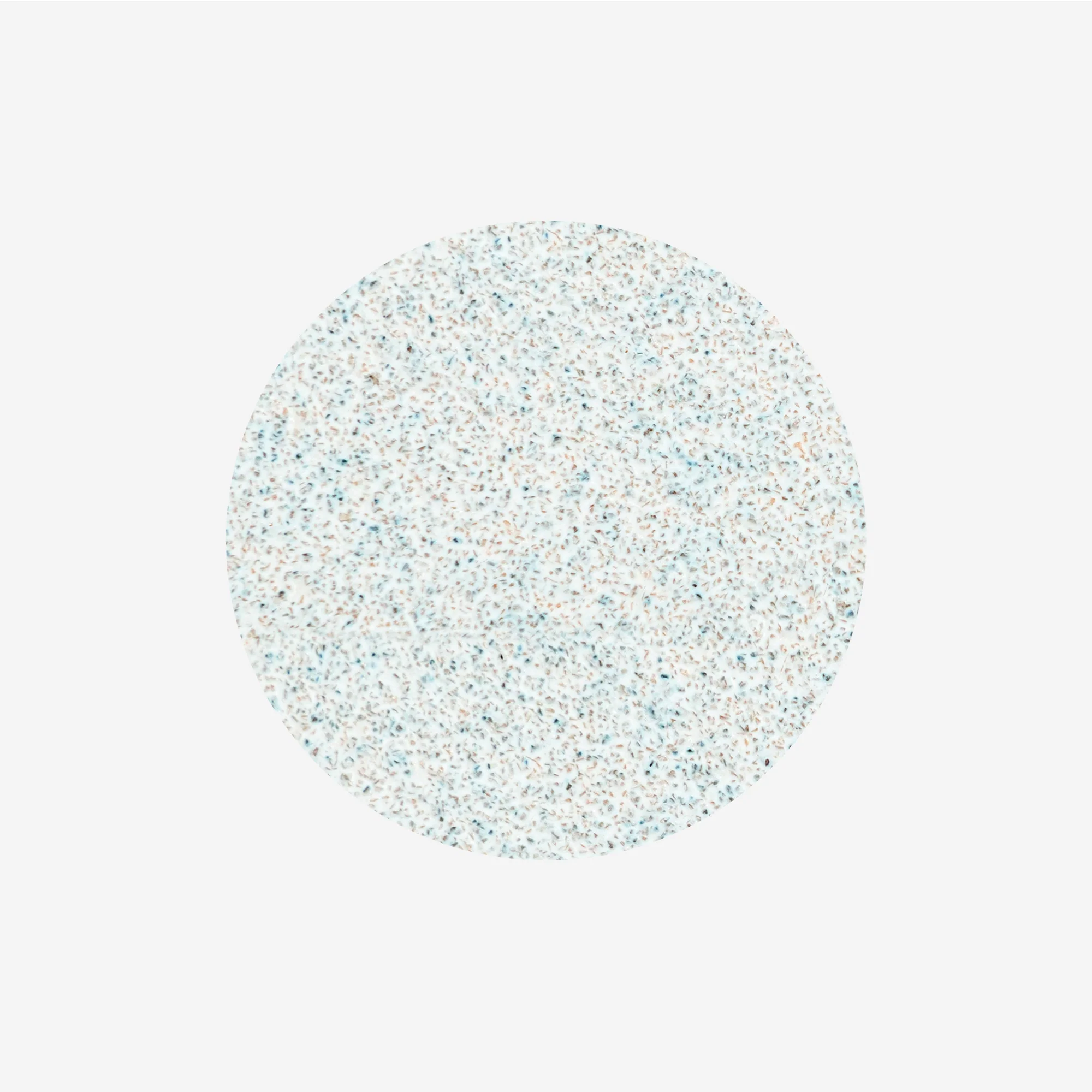 Runder Glitzerstein mit glitzerndem Muster in sanften Farben