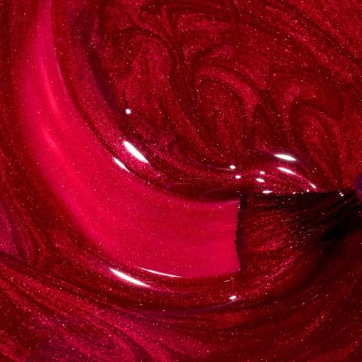 Glänzender roter Nagellack mit feinem Glitzer und Pinsel