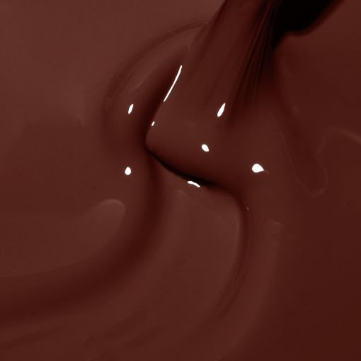 Nahaufnahme von flüssiger, glänzender dunkler Schokolade